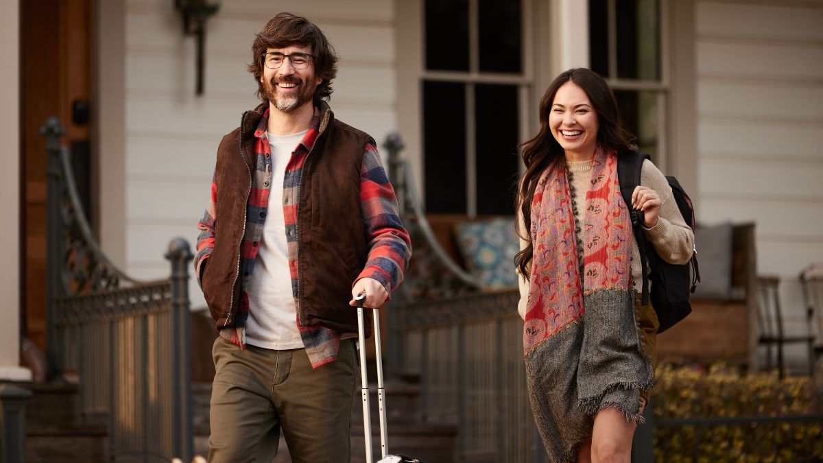Man wearing glasses with woman